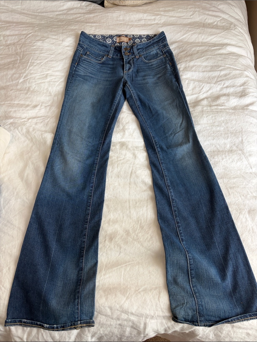 PAIGE Dark Medium Wash Flared Jeans